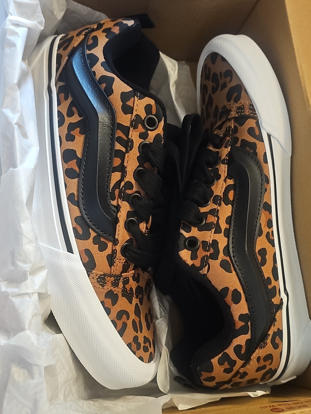 Vans Leopard Print Low Top Sneakers in Brown and Black